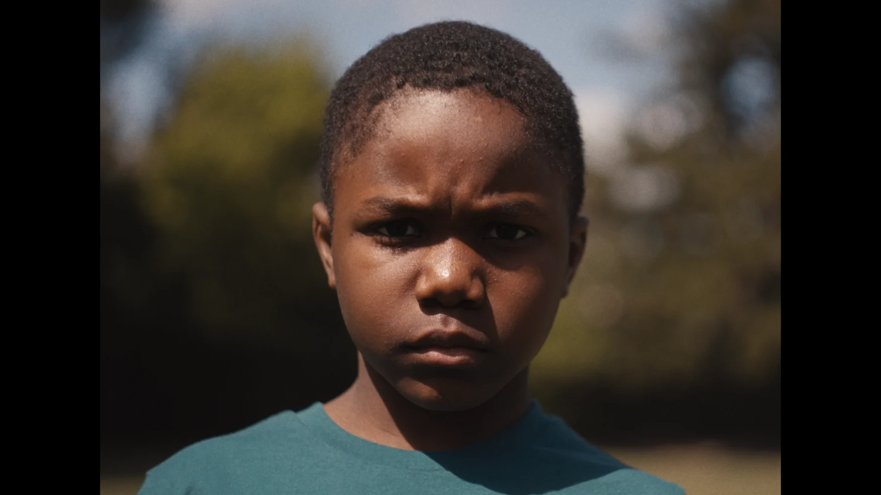 Portrait of a young boy outdoors