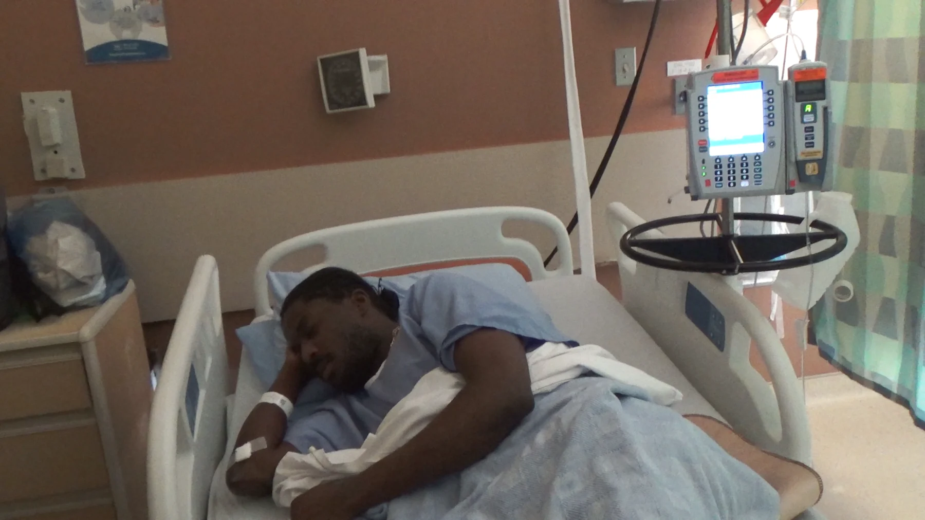 Gabriel resting in a hospital bed